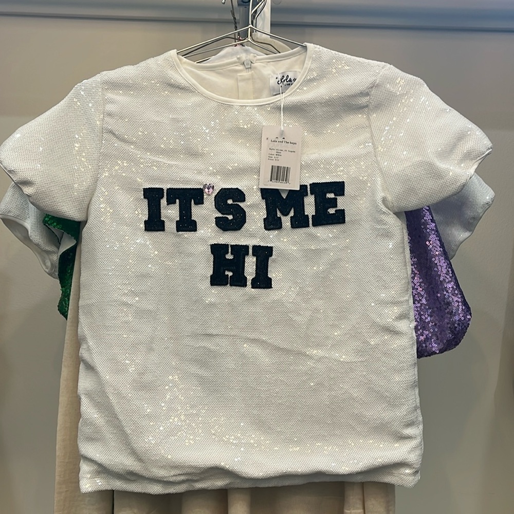 White sequin top never worn.